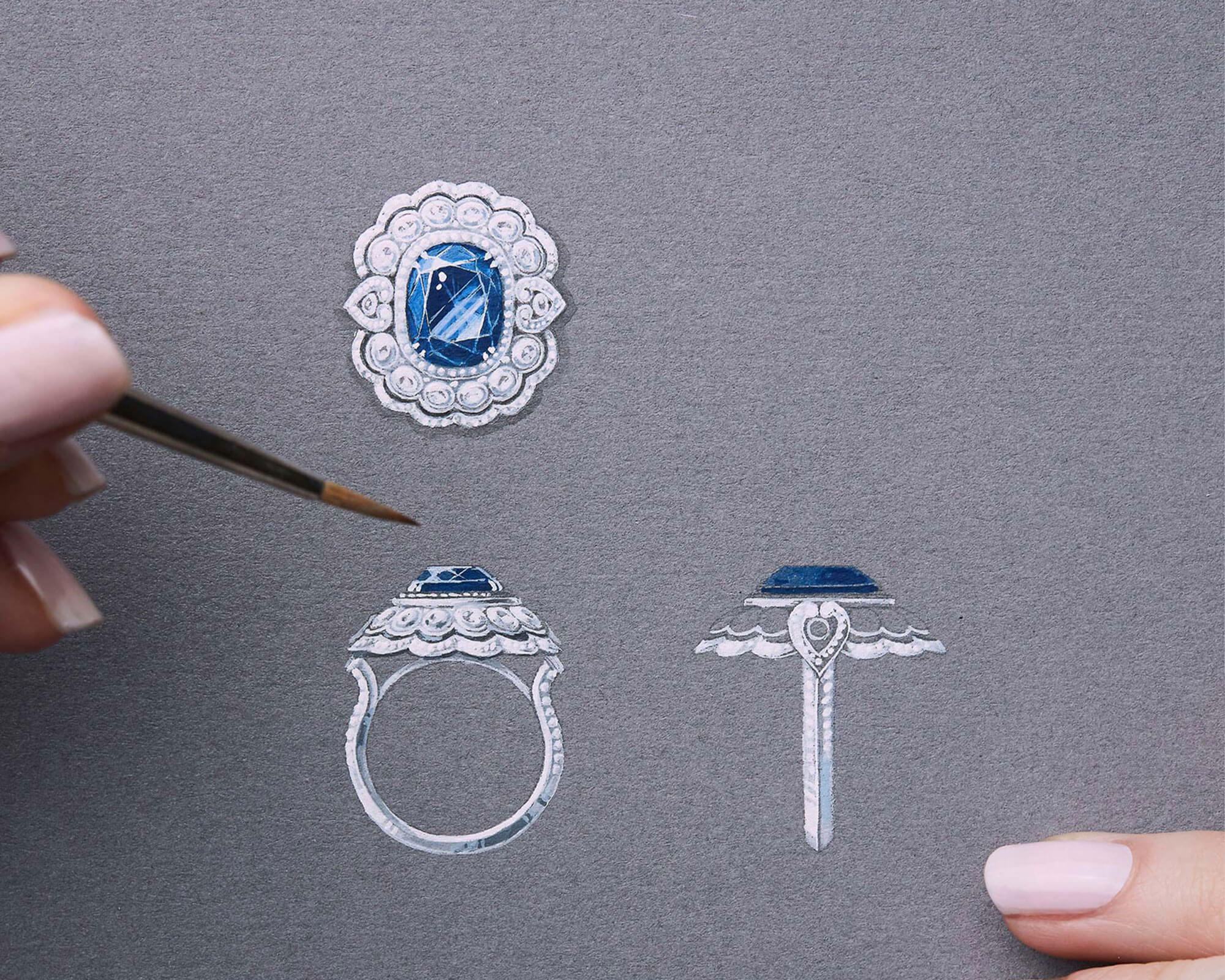 a Garrard jewellery designer skethcing a bespoke sapphire Garrard engagement ring on gouache paper portrait
