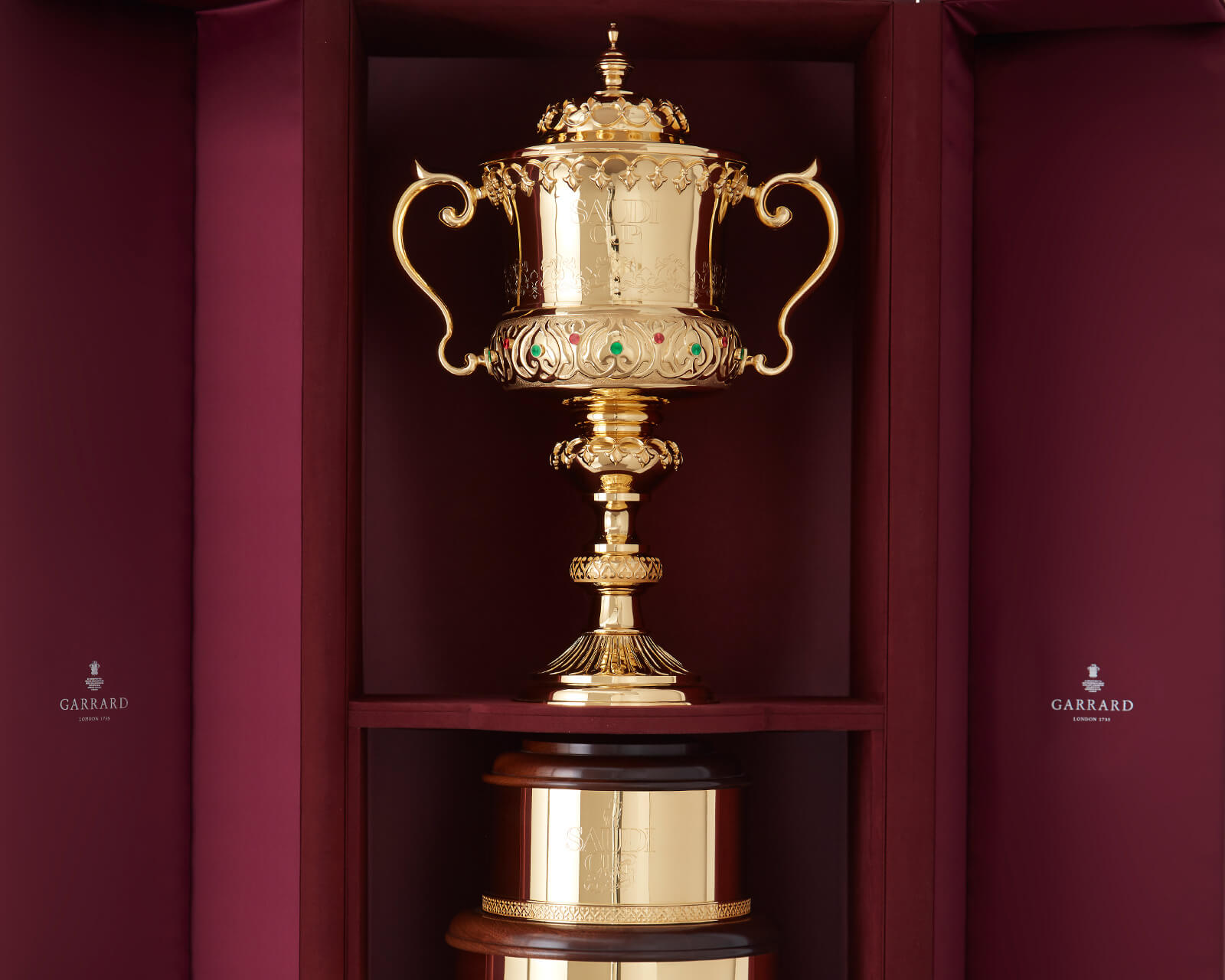 a Garrard trophie in a fitted Garrard presentation case