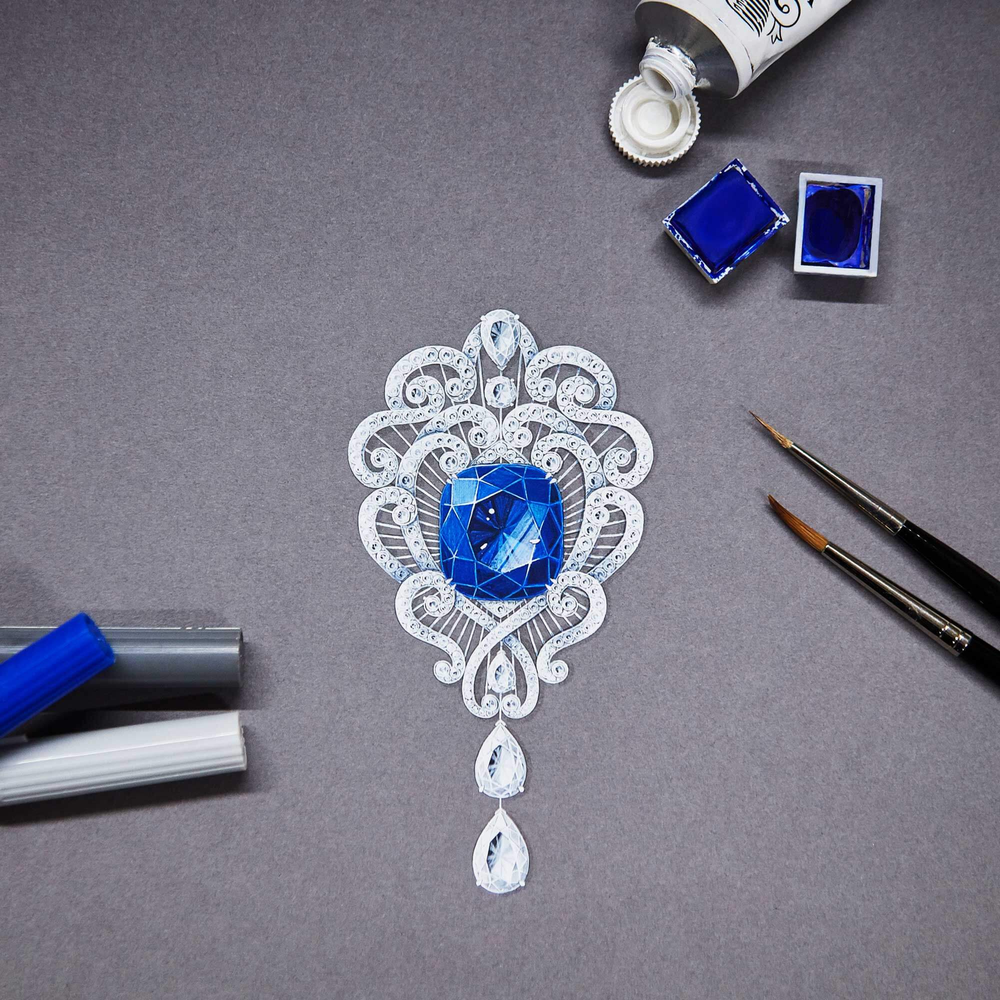 Close up of a gouache painting of a sapphire and diamond brooch at Garrard design workship