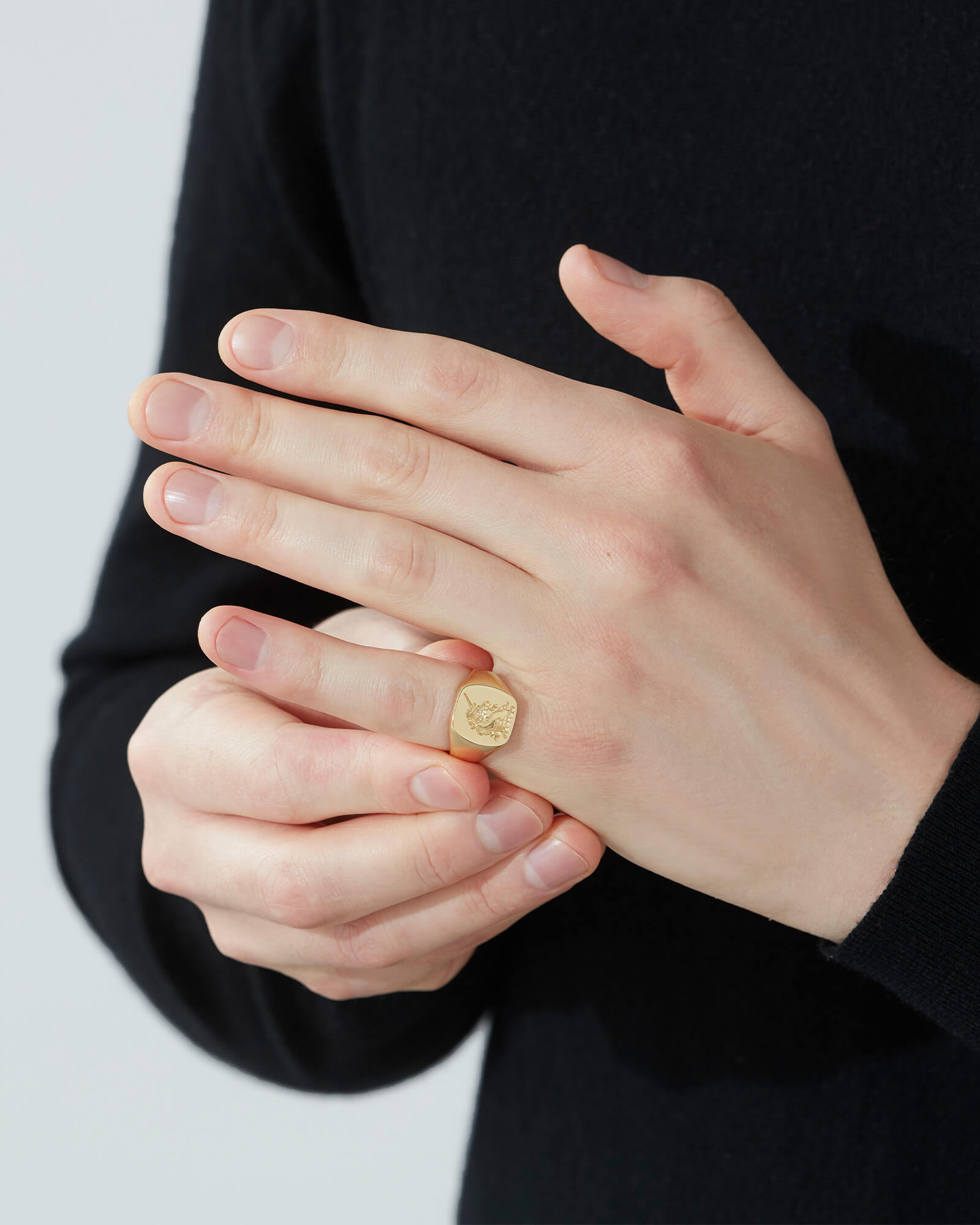 Engraved Signet Ring Garrard on male model 1