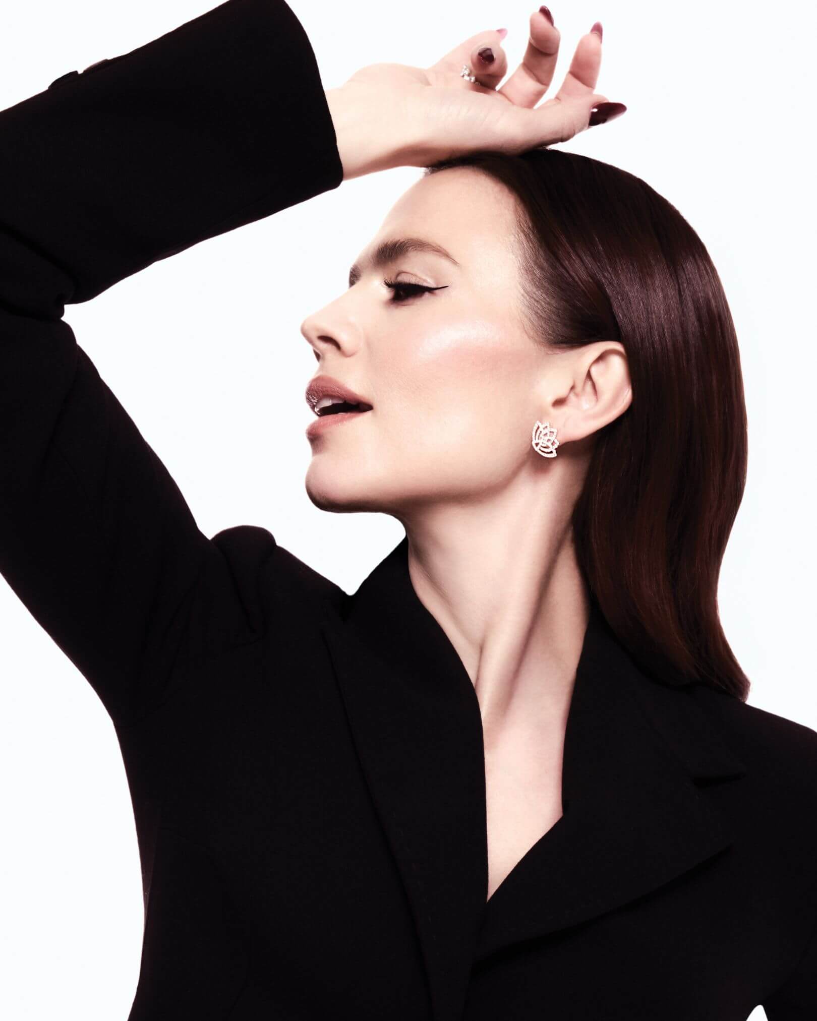 Hayley Atwell graces the cover of The Glossary Magazine's latest CREATIVES Issue, wearing Garrard's striking jewellery Lotus