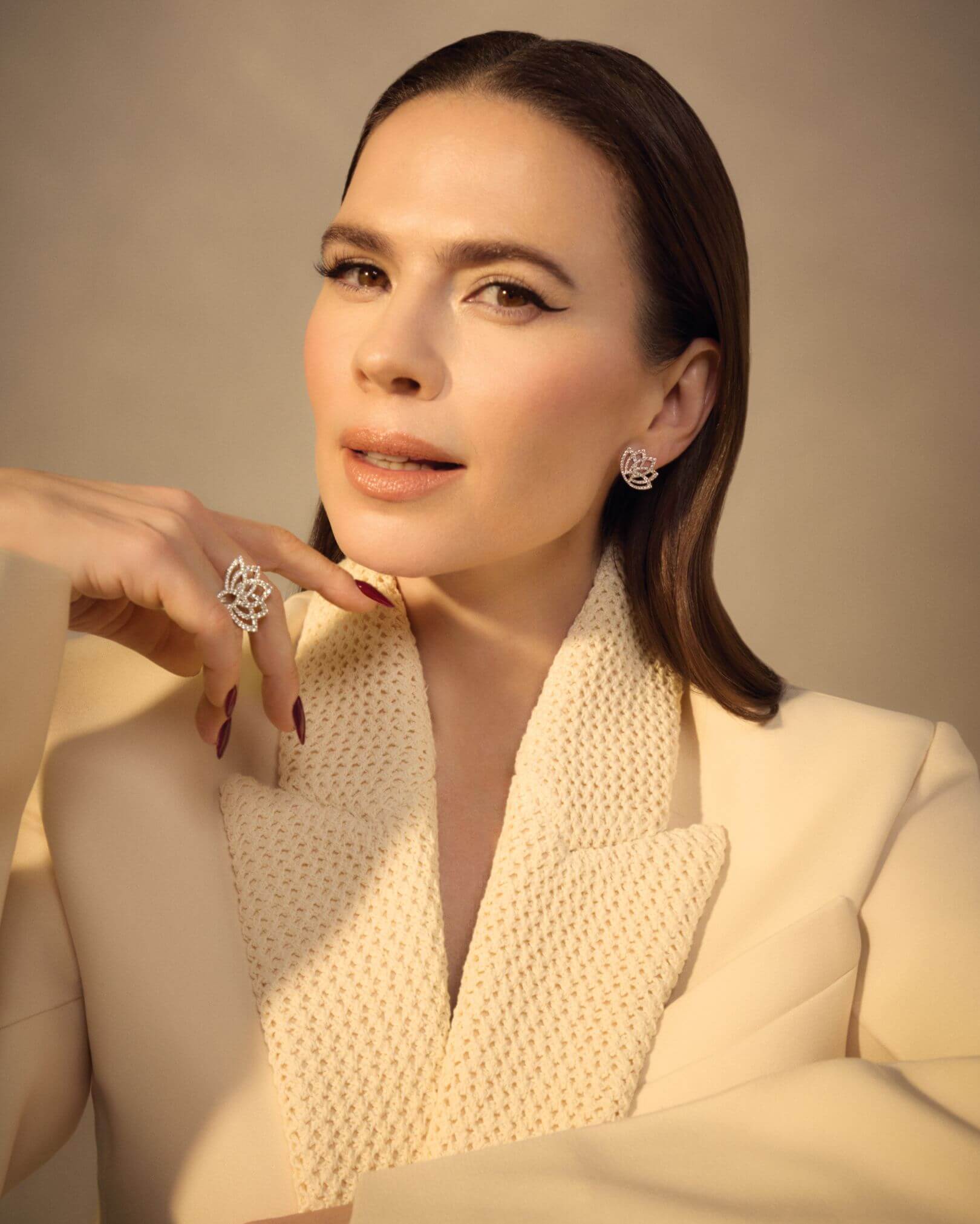 Hayley Atwell graces the cover of The Glossary Magazine's latest CREATIVES Issue, wearing Garrard's striking Lotus jewellery