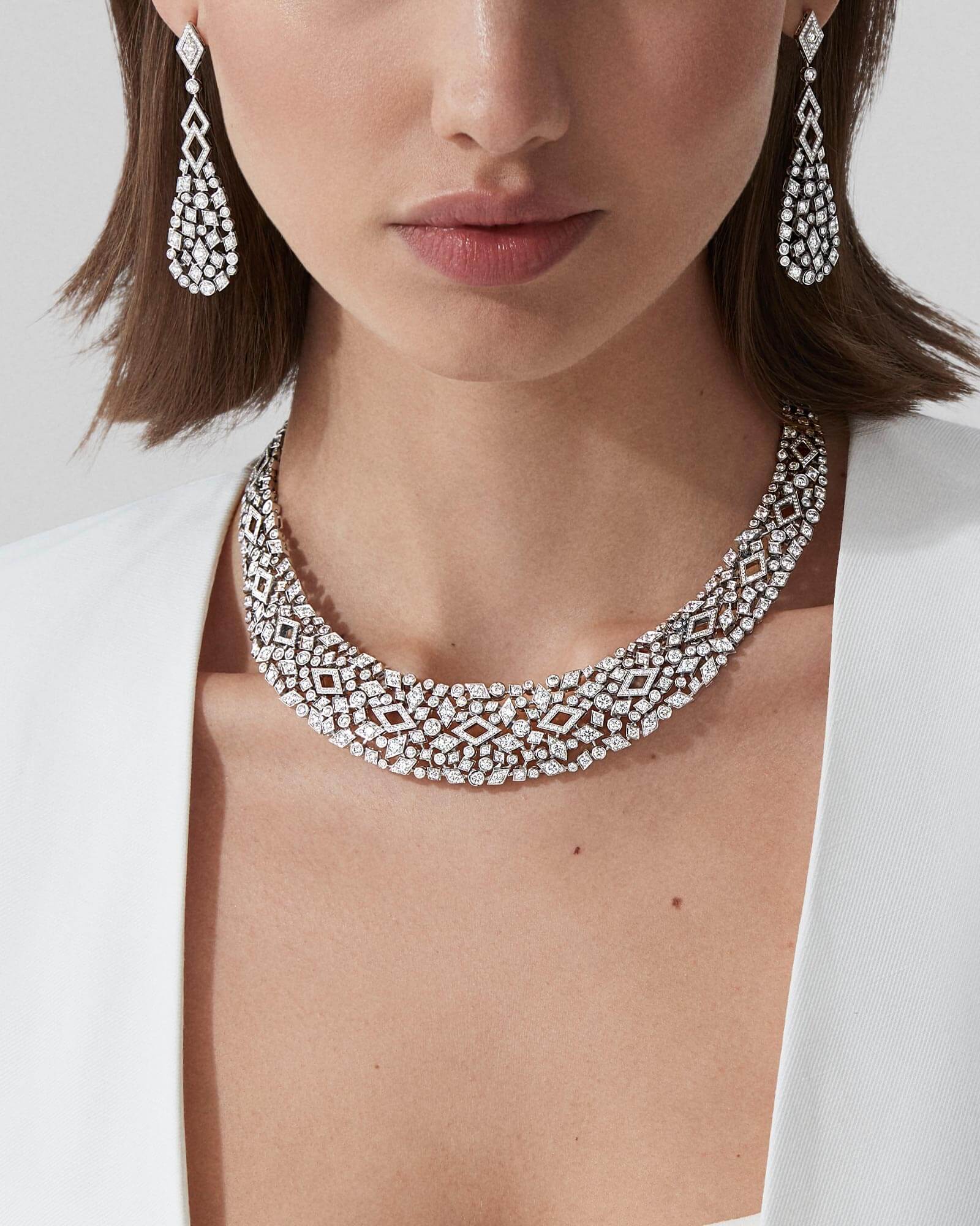 Model wears Garrard high jewellery collection Albemarle High Jewellery Suite close up