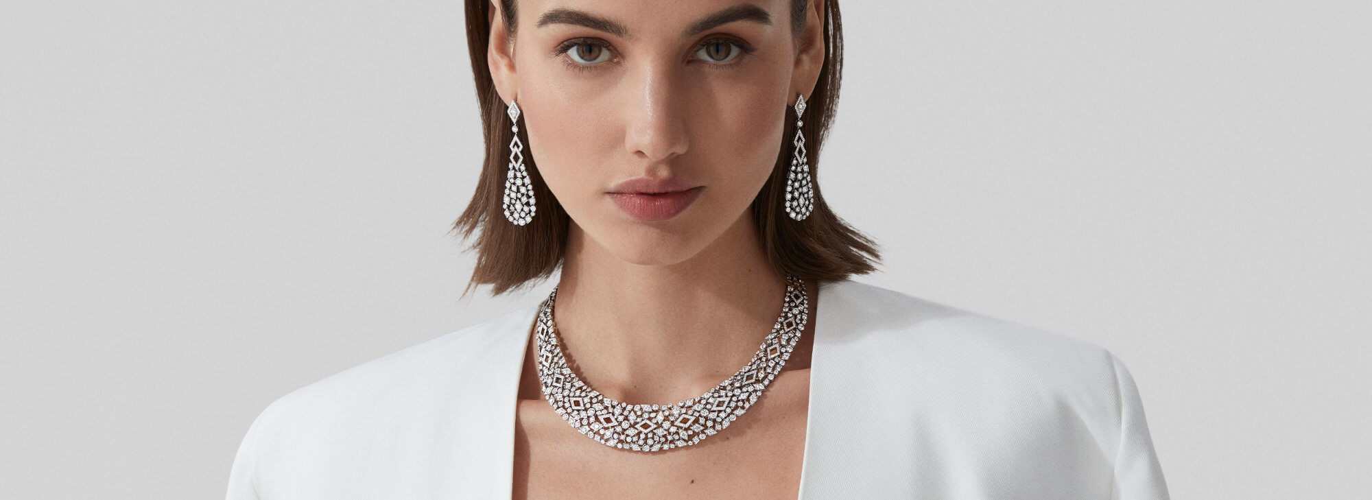 Model wears Garrard high jewellery collection Albemarle High Jewellery Suite desktop 2023