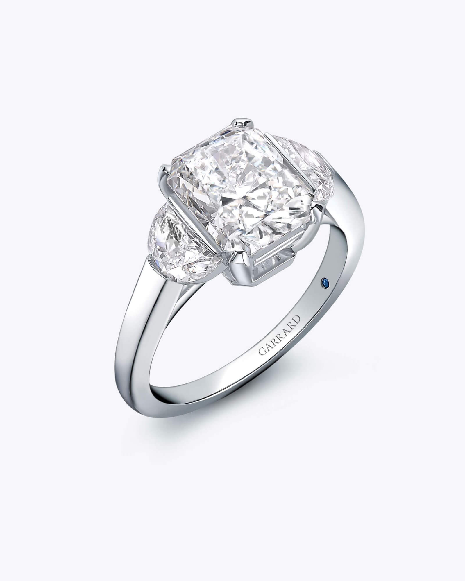 The Garrard Charisma Radiant Cut Diamond Three Stone Engagement Ring