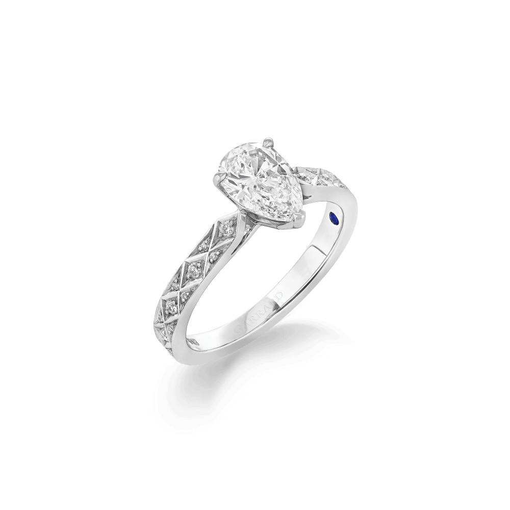 Garrard Bridal collection Signature Pear Shape Diamond Solitaire Engagement Ring In Platinum with Diamonds JRSGPT01 2017577 HERO 1